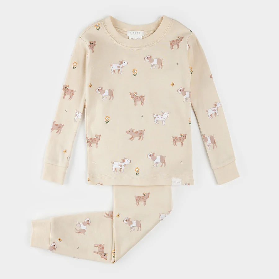 Porcelets sur pyjama blanc antique pour bébé