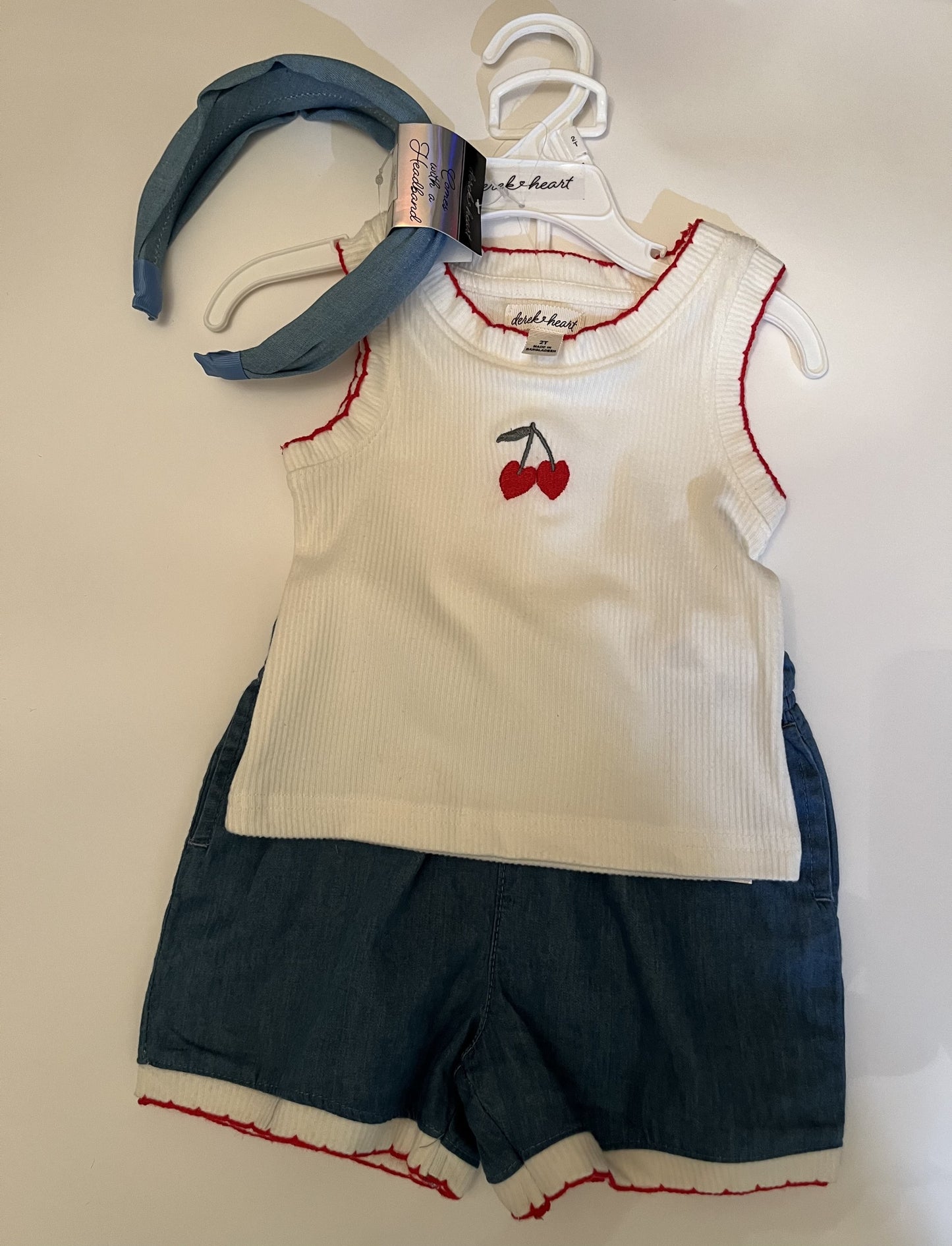 Ensemble 3 morceaux-camisole, short et serre tète.