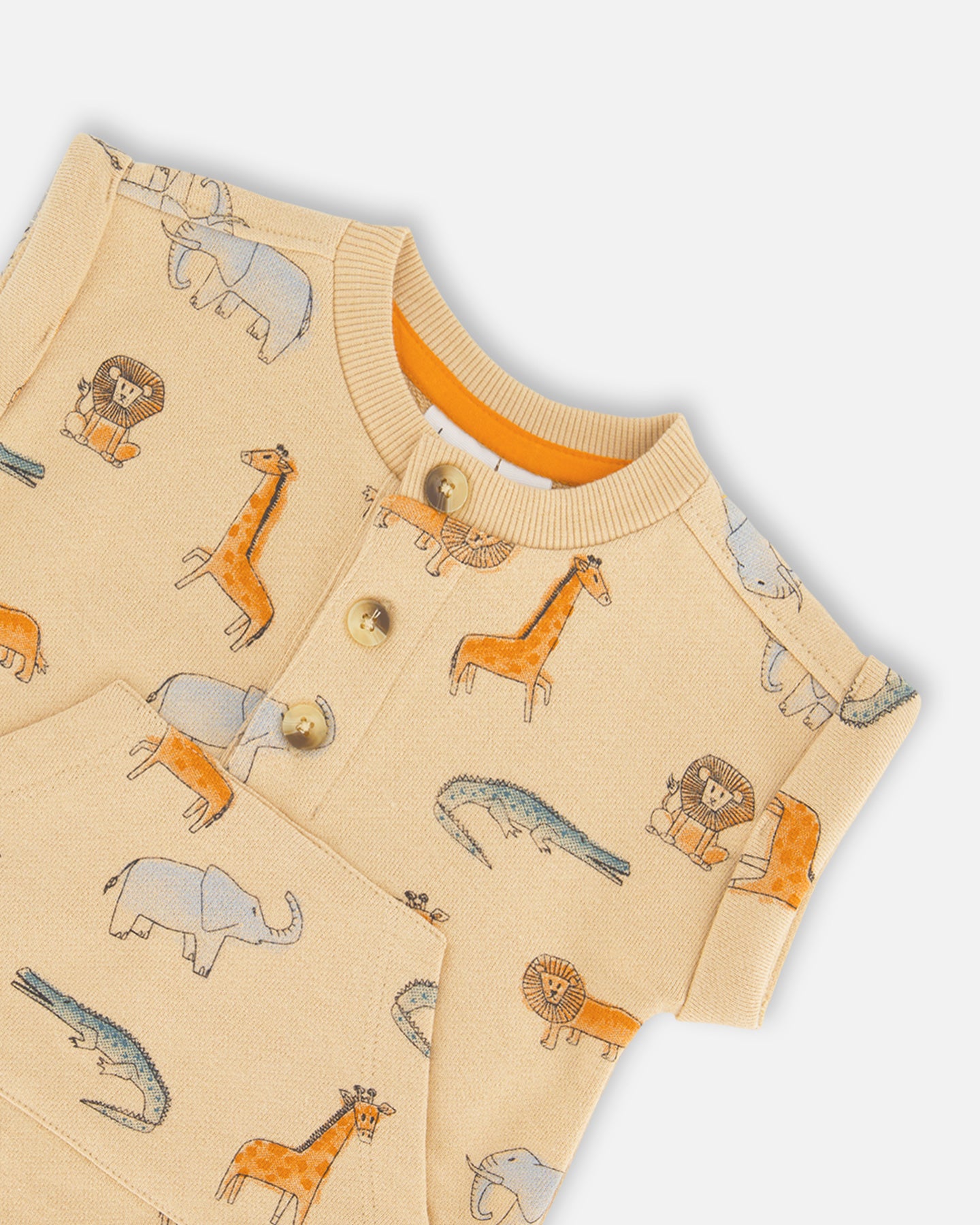 Barboteuse beige imprimée d'animaux en coton français