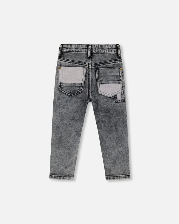 Pantalon en denim extensible noir avec empiècements contrastés