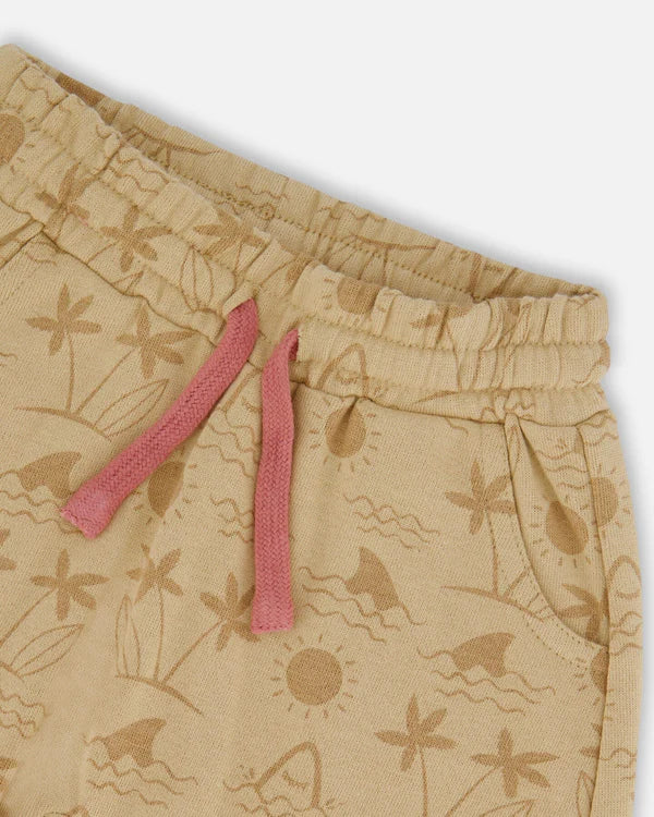 Ensemble haut à manches courtes et short en molleton beige avec palmiers et camion bleu