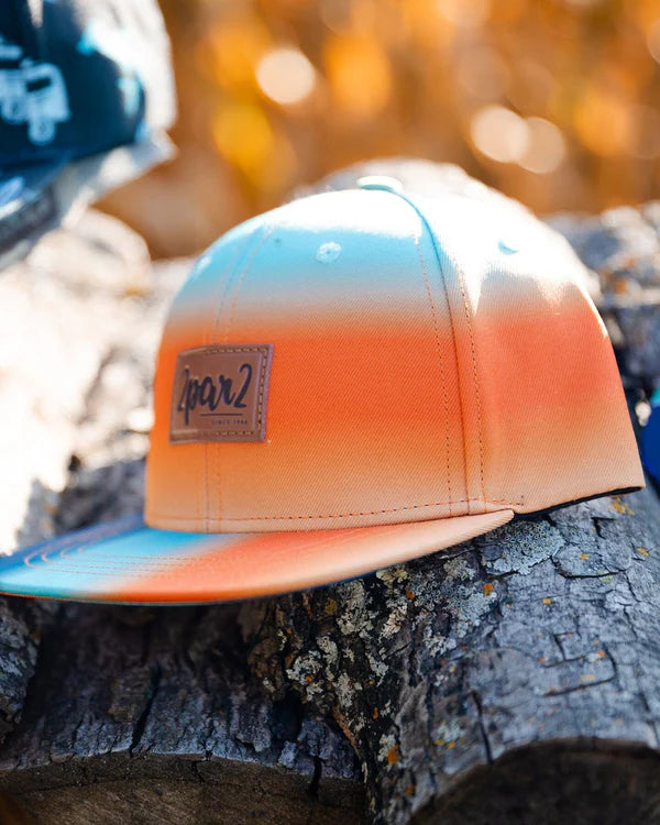 Casquette imprimée bleu marine, turquoise et orange
