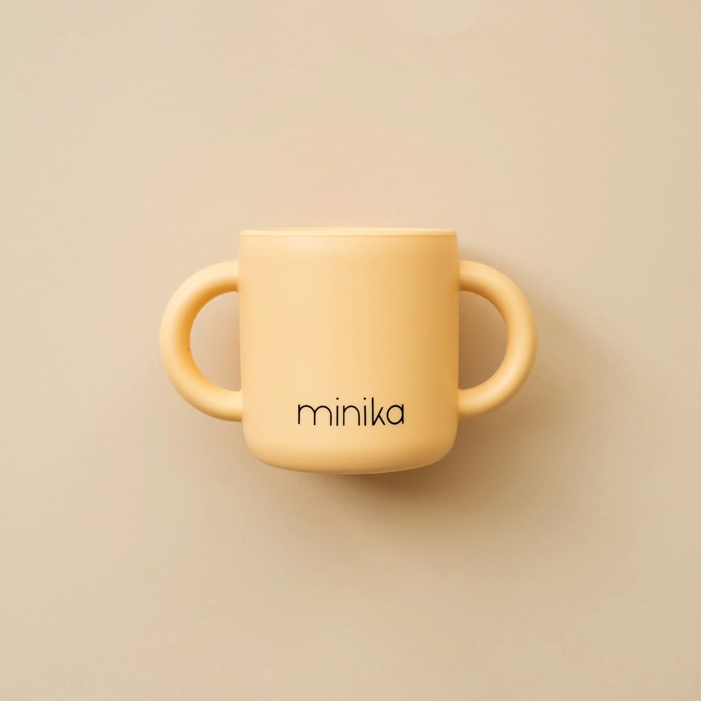Tasse d'apprentissage avec poignées