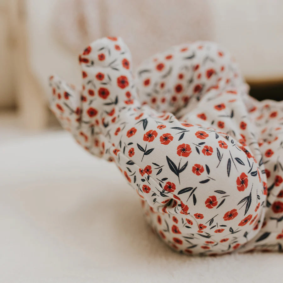 Pyjama à imprimé floral coquelicot sur dormeuse beige
